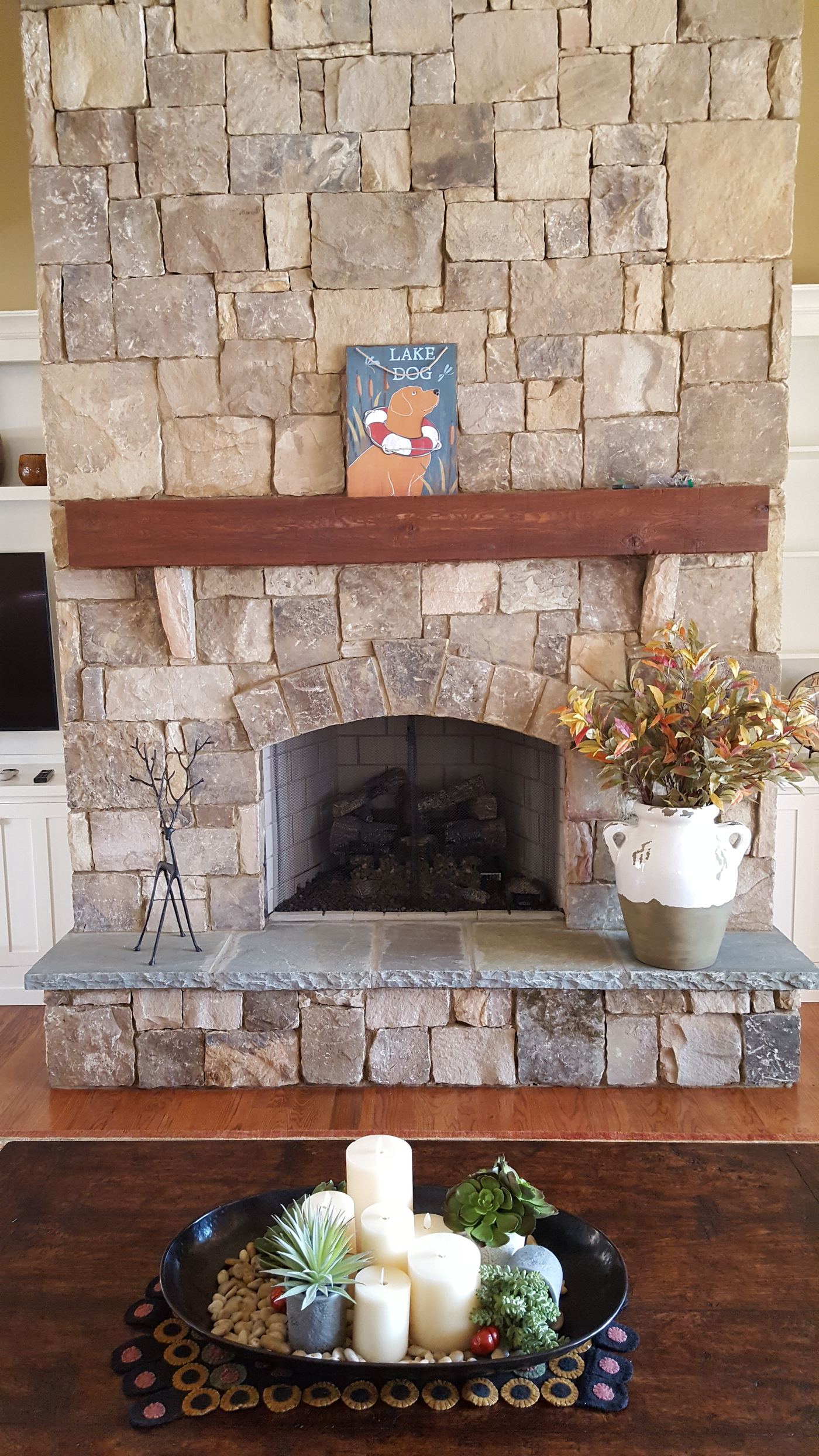Stone fireplace with mantle